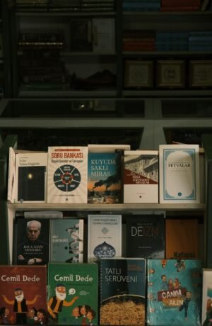 A bookshelf displaying a variety of books in a bookstore setting.