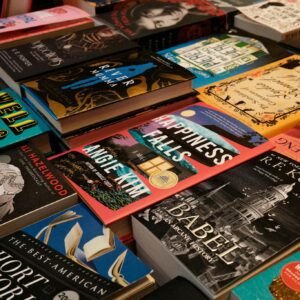 Diverse collection of bestsellers displayed at a New York bookstore, featuring colorful covers and popular titles.