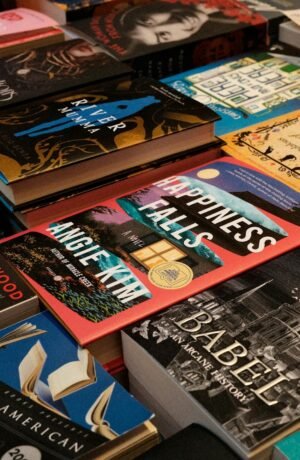Diverse collection of bestsellers displayed at a New York bookstore, featuring colorful covers and popular titles.